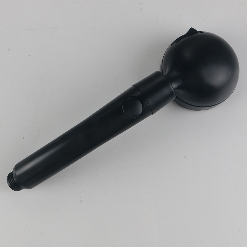 Ducha japonesa con cabezal abatible negro.